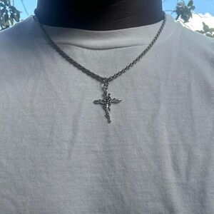 Vintage stainless steel rose cross pendant